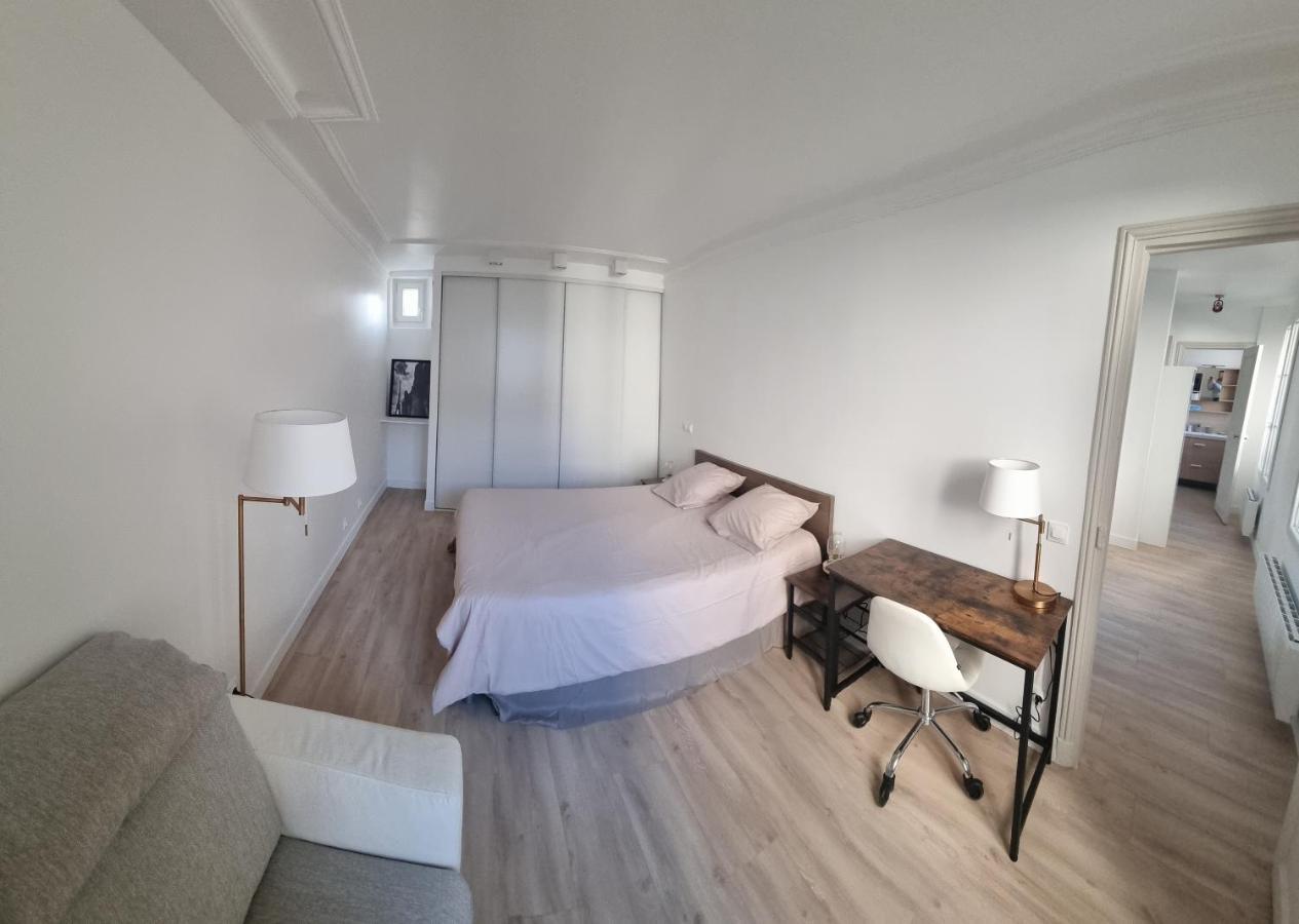 Appartement Luxueux Dans Maison Bourgeoise Parisienne 勒瓦卢瓦-佩雷 外观 照片