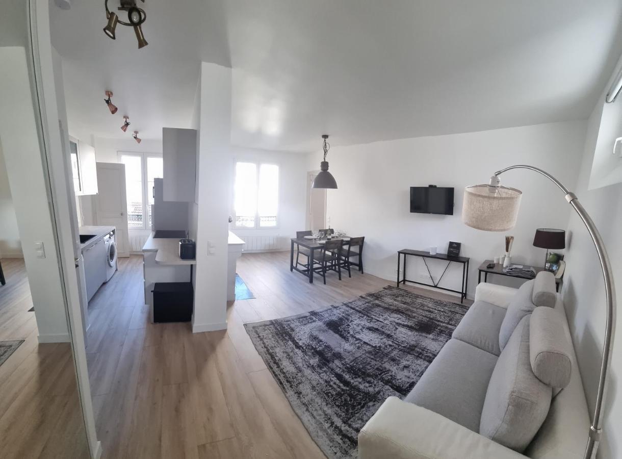 Appartement Luxueux Dans Maison Bourgeoise Parisienne 勒瓦卢瓦-佩雷 外观 照片