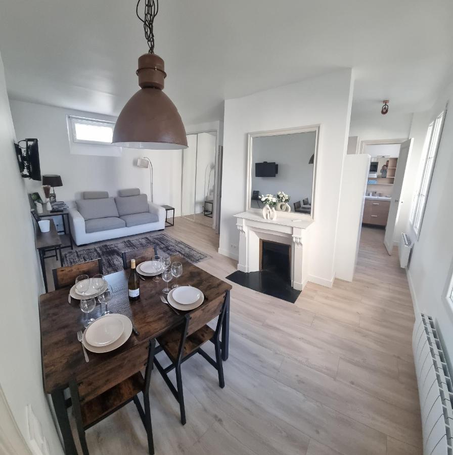 Appartement Luxueux Dans Maison Bourgeoise Parisienne 勒瓦卢瓦-佩雷 外观 照片