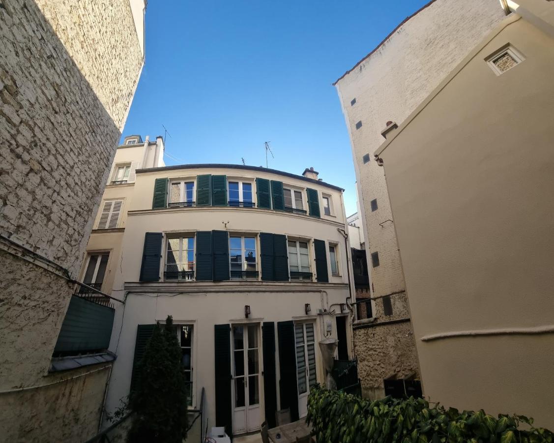 Appartement Luxueux Dans Maison Bourgeoise Parisienne 勒瓦卢瓦-佩雷 外观 照片