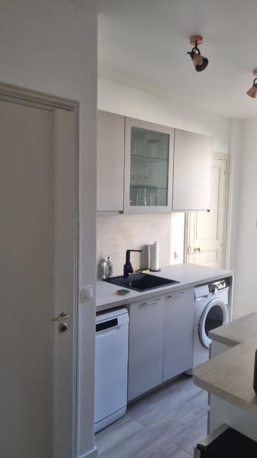 Appartement Luxueux Dans Maison Bourgeoise Parisienne 勒瓦卢瓦-佩雷 外观 照片