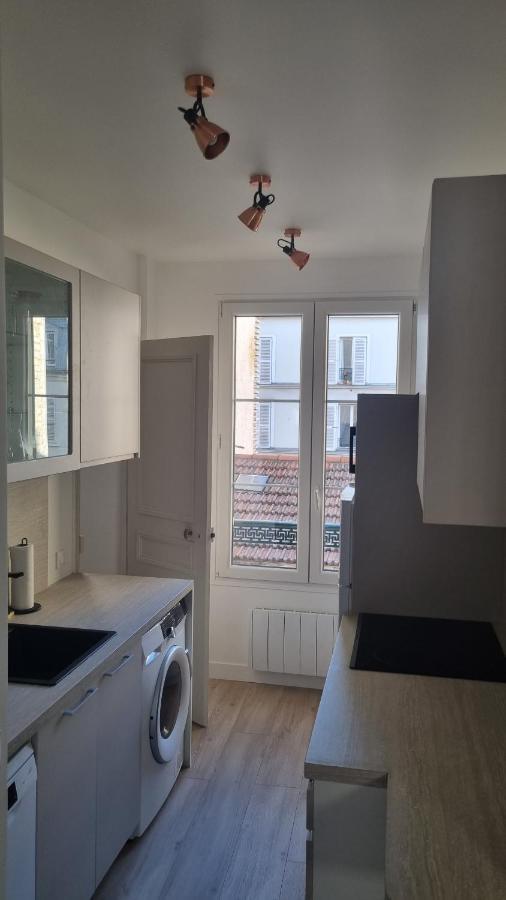 Appartement Luxueux Dans Maison Bourgeoise Parisienne 勒瓦卢瓦-佩雷 外观 照片