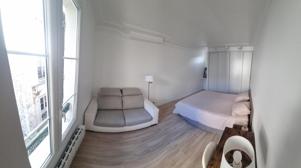 Appartement Luxueux Dans Maison Bourgeoise Parisienne 勒瓦卢瓦-佩雷 外观 照片