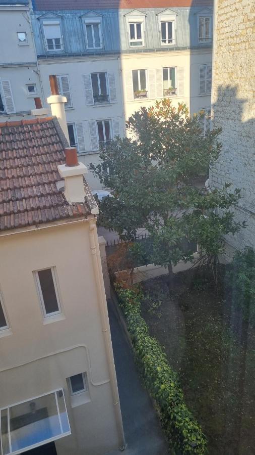 Appartement Luxueux Dans Maison Bourgeoise Parisienne 勒瓦卢瓦-佩雷 外观 照片